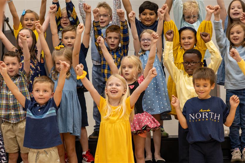 Students cut ribbon at new school